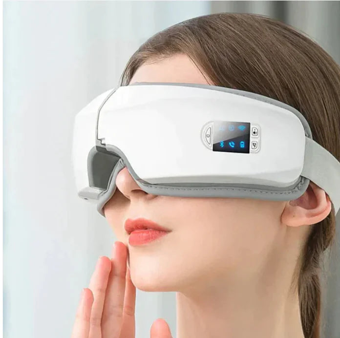 Bluetooth Heated Eye Massager worn by woman relaxing